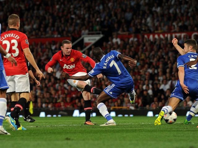 Wayne Rooney: Ramires blocks a shot from the United striker