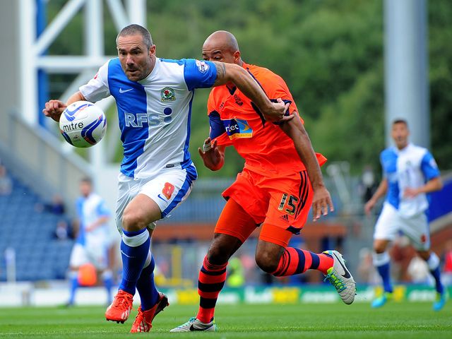 David Dunn runs away from Alex Baptiste.