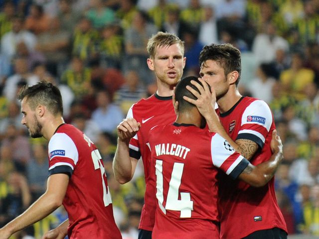 Olivier Giroud celebrates scoring Arsenal's third goal from the spot