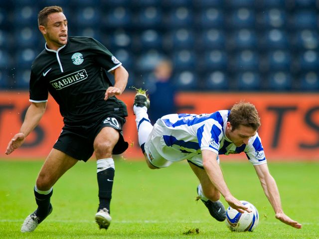 Paul Heffernan hits the ground after a tackle from Tom Taiwo.