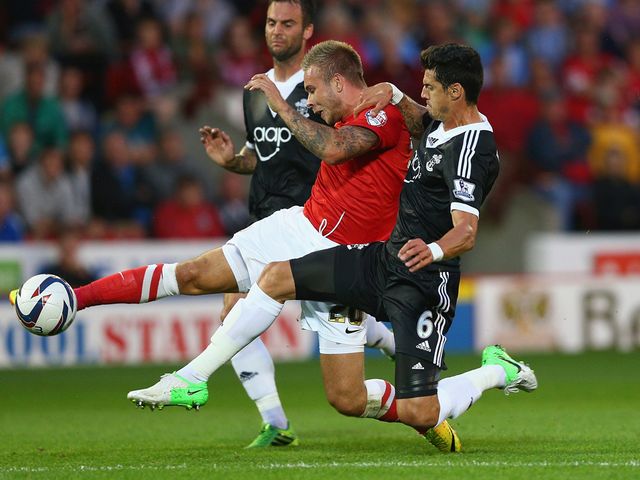 Marcus Pedersen and Jose Fonte in action on Tuesday