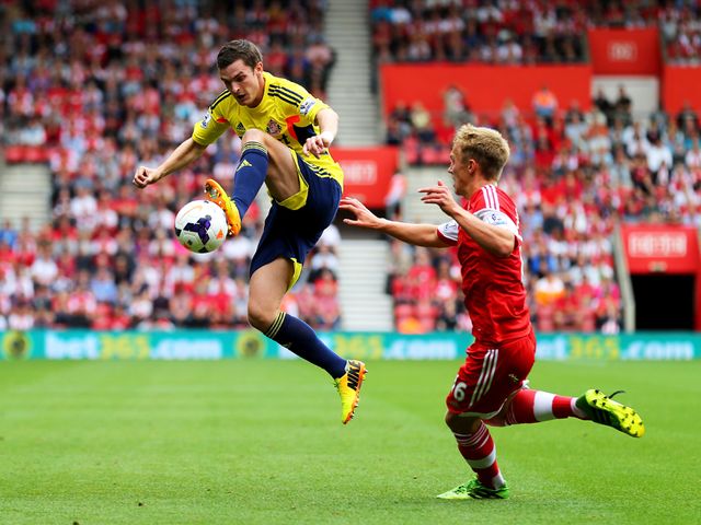 Adam Johnson takes control of the ball.