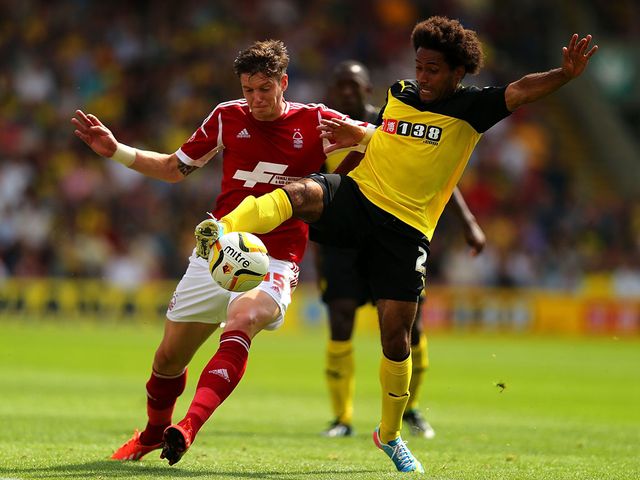 Greg Halford and Ikechi Anya battle for the ball