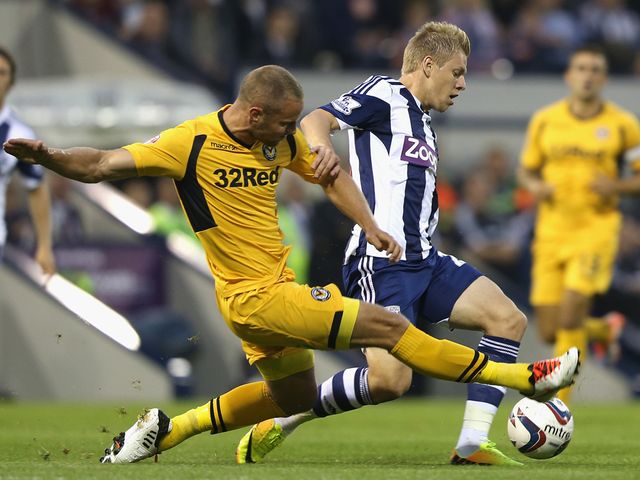 Matej Vydra is tackled by Harry Worley