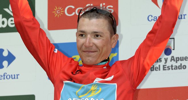 Janez Brajkovic led Astana over the line and now wears the leader's red jersey