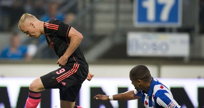 Ajax's Kolbeinn Sigthorsson is challenged by Heerenveen's Kenneth Otigba