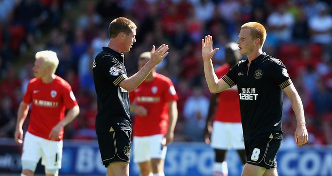 Ben Watson: Celebrates putting Wigan ahead at Barnsley