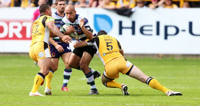 Castleford's Kirk Dixon and Weller Hauraki combine to stop Bradford's Keith Lulia