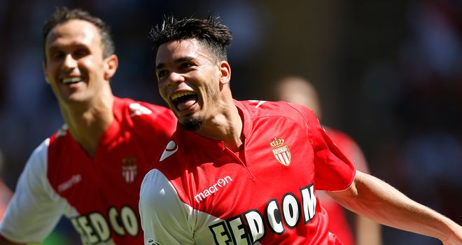 Riviere celebrates one of his three goals against Montpellier