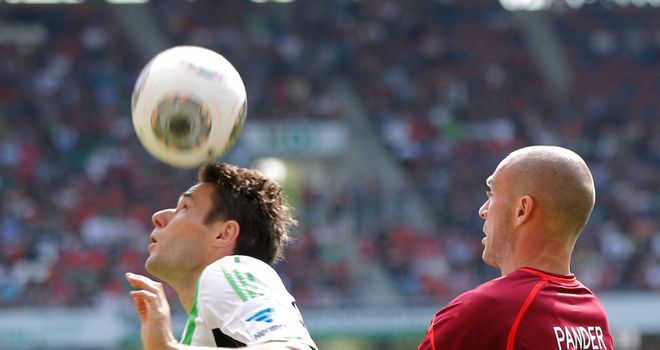 Traesch and Pander keep focus on the ball.