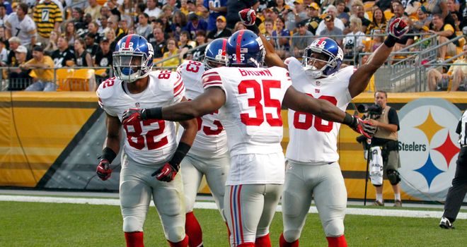 The New York Giants celebrate a touchdown by Victor Cruz against the Pittsburgh Steelers