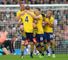 Lukas Podolski: Bagged a brace for Arsenal