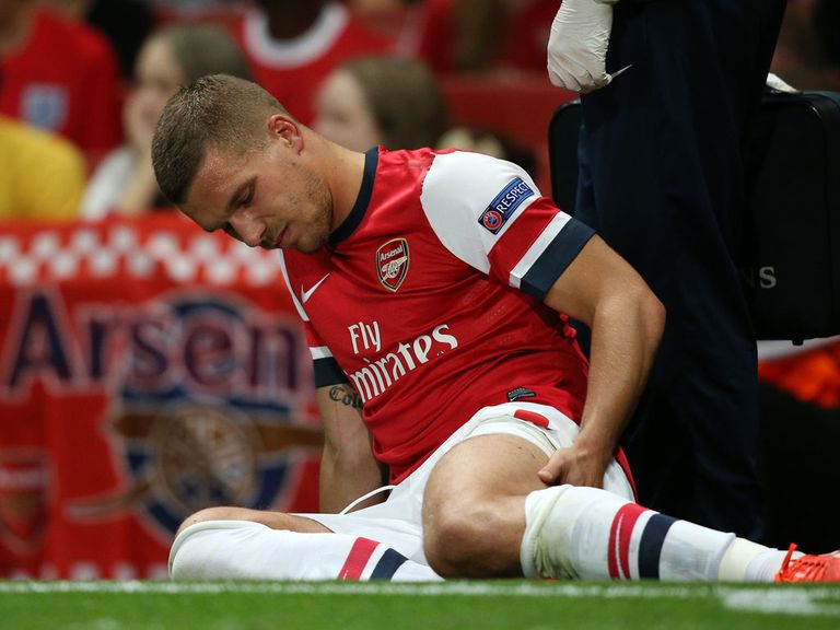 Lukas Podolski: Stretchered off against Fenerbahce