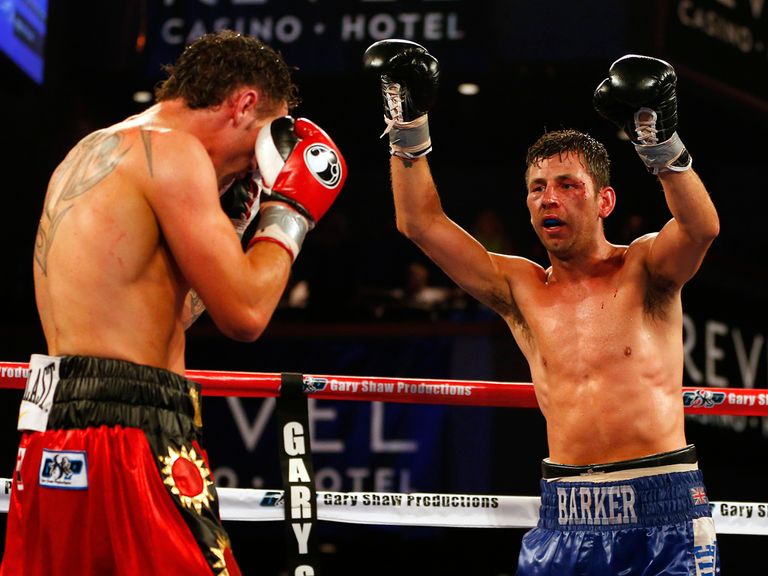 Darren Barker celebrates in the closing seconds of the fight
