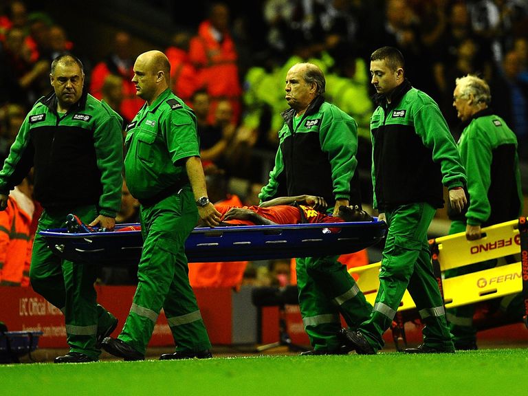 Kolo Toure leaves the field on a stretcher