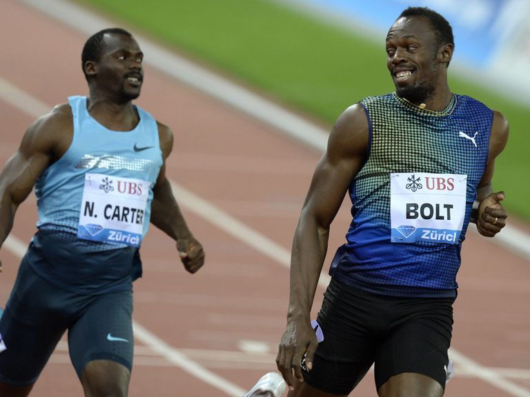 Usain Bolt enjoys his victory.