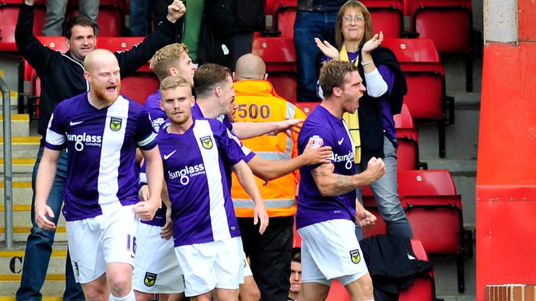 Johnny Mullins: Celebrates his goal for Oxford at Cheltenham