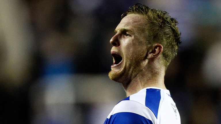 Alex Pearce celebrates victory