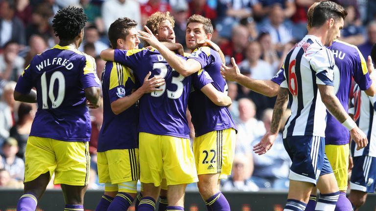 Ben Davies: Celebrates his opener for the visitors