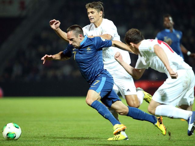 Franck Ribery tries to get forward for France