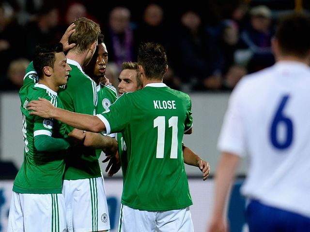 Per Mertesacker celebrates his goal for Germany
