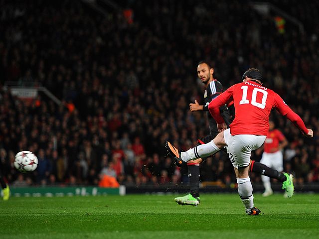 Wayne Rooney scores his second goal of the night