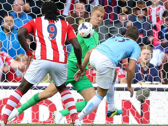 Joe Hart pulls off a save to deny Stoke a goal