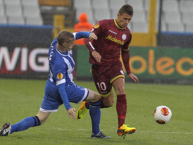 James McClean and Thorgan Hazard battle for the ball