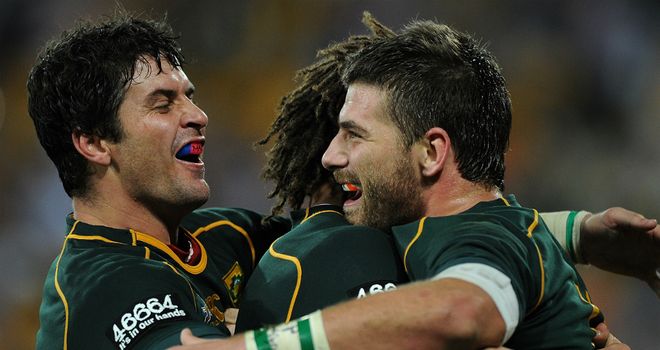 South Africa celebrate a Willie le Roux try against Australia