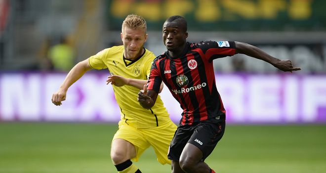 Jakub Blaszczykowski and Constant Djapka in action.