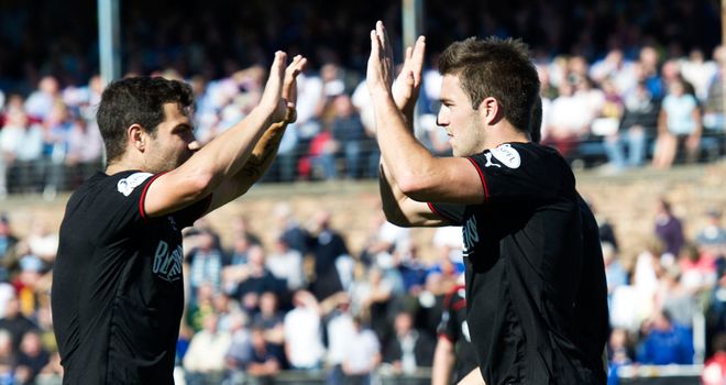 Andrew Little (right) celebrates his goal with Richard Foster