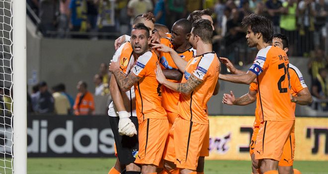 APOEL Nicosia celebrate Urko's penalty save