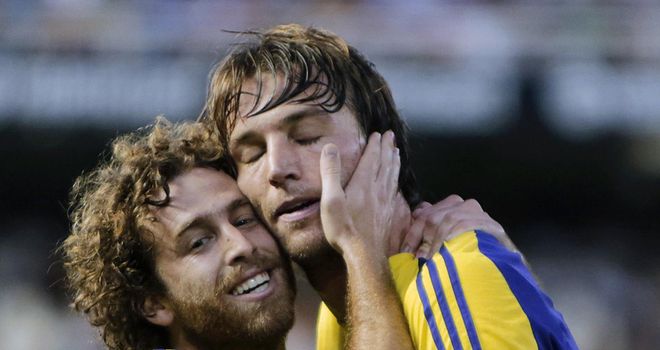 Michu: Celebrates his superb goal against Valencia