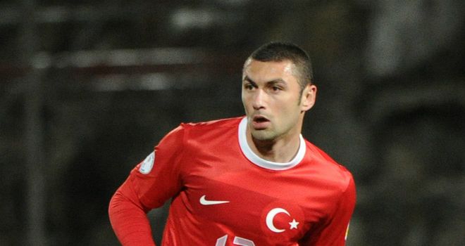 Burak Yilmaz scored the opening goal as Turkey kept their World Cup hopes alive in Romania