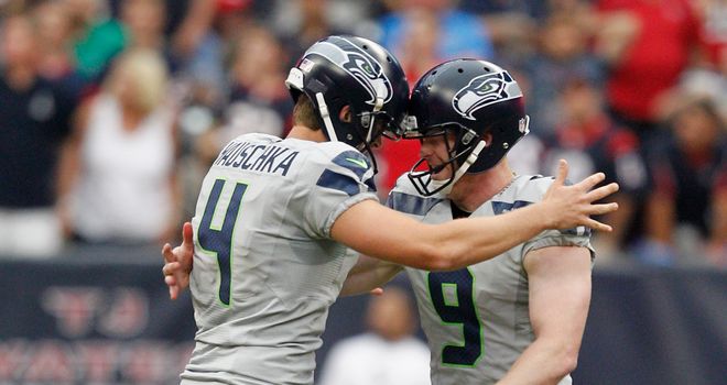 Steven Hauschka is congratulated by Jon Ryan after kicking a 45-yard field goal in overtime for the Seattle Seahawks