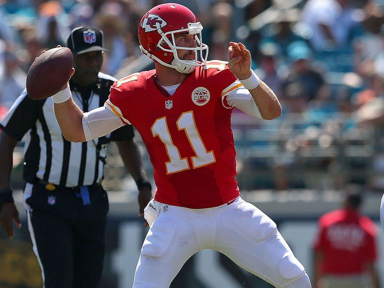 Alex Smith prepares to gun a pass downfield