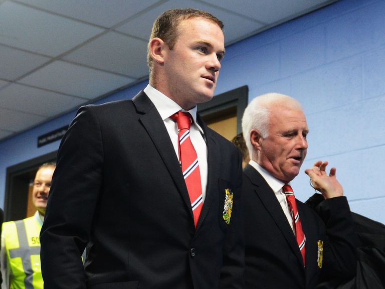 Wayne Rooney: Insists he has been settled all summer