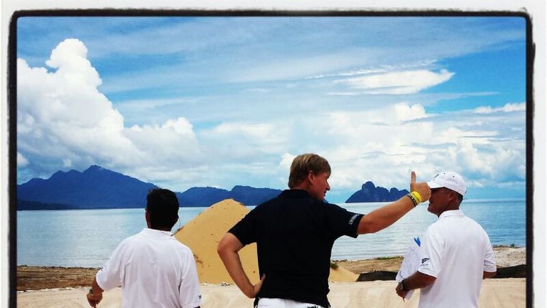 Ernie Els surveys the 17th green overlooking the stunning Andaman sea.