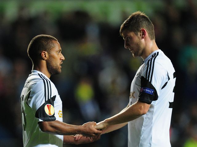 Wayne Routledge celebrates his goal with Ben Davies