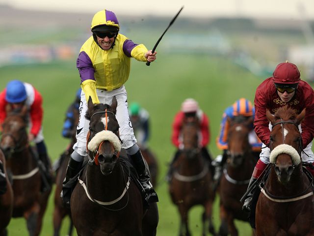 Neil Callan celebrates Astaire's win in the Middle Park
