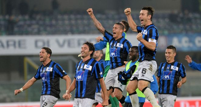 Atalanta celebrate their victory at Chievo