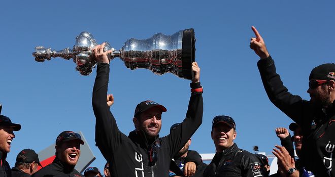 Sir Ben Ainslie holds aloft the America's Cup after last year's thrilling victory
