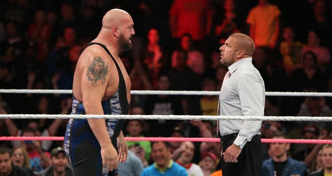 Big Show (L) was put in a four-on-one duel by Triple H