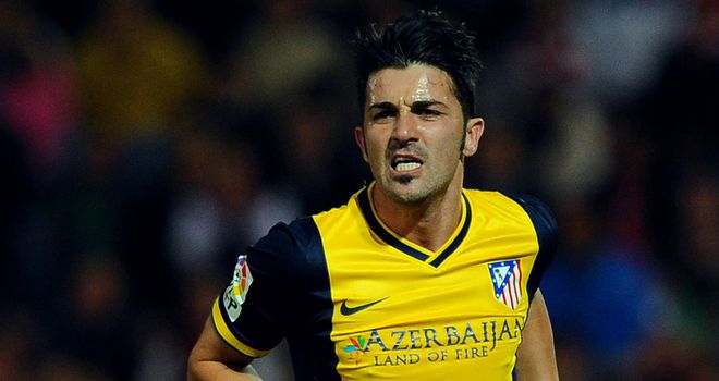 David Villa celebrates.