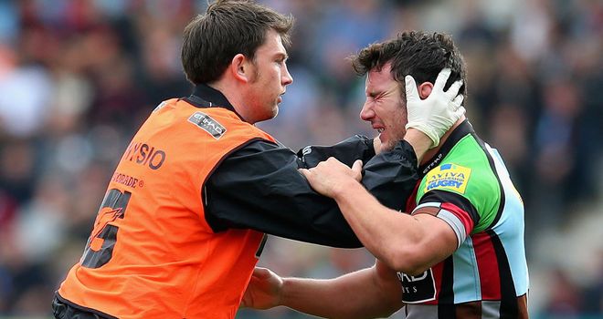 George Lowes receives treatment for the injury that ended his season with Harlequins