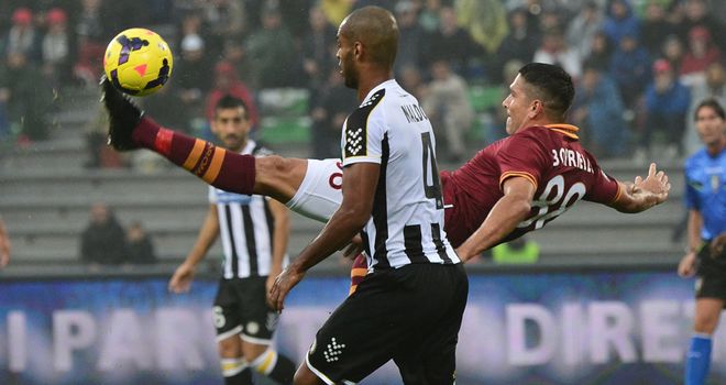 Marco Borriello fights for the ball.