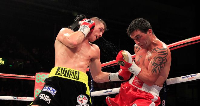 Callum Smith lands a shot against Ruben Acosta (photo courtesy of Lawrence Lustig)