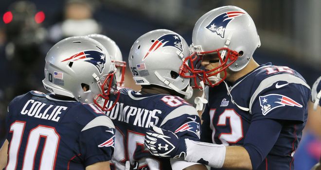 Tom Brady celebrates with Kenbrell Thompkins after they connected for the winning touchdown