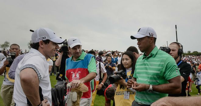 Rory McIlroy and Tiger Woods chat in China