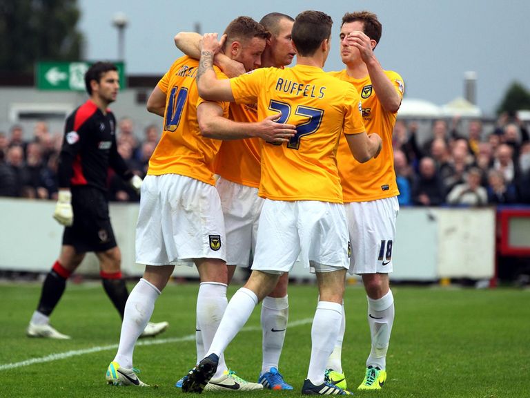 Oxford celebrate as they move to the top of the table.